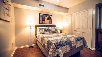 1 bedroom, desk, iron/ironing board, travel crib