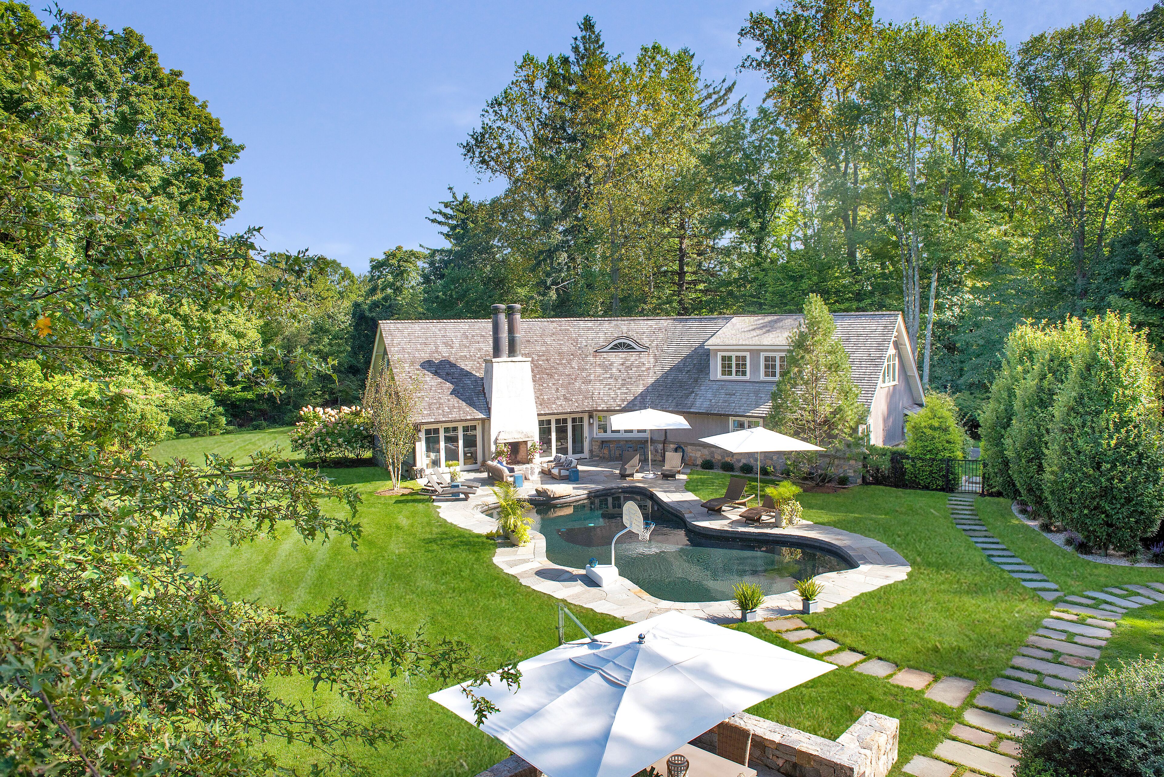 CT Retreat: Stunning, Expansive Compound with a Gorgeous Barn and Outdoor Pool
