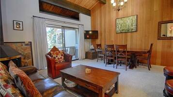 Condo, Multiple Beds (The Rustic Nook (Condo)) | Living room | TV, fireplace, DVD player, ping pong