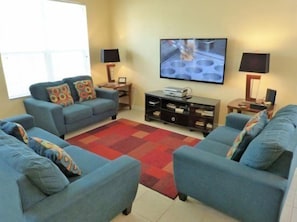 House | Living room | TV, video-game console, DVD player, foosball