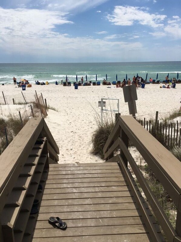 On the beach, sun-loungers, beach towels