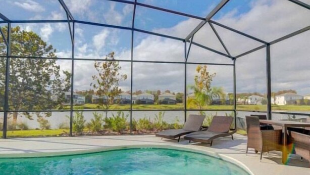 Outdoor pool - Lake View 6 Bedroom 4 Bath Pool Home in Bella Vida Resort (Kissimmee)