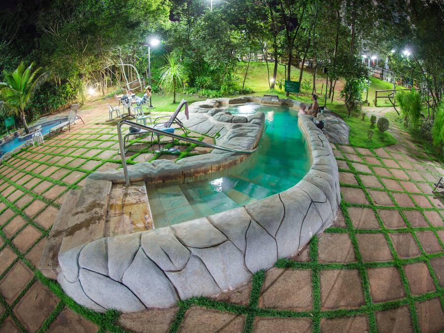 7 outdoor pools, open 7:00 AM to 11:00 PM, pool loungers