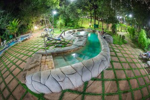 7 outdoor pools, open 7:00 AM to 11:00 PM, sun loungers