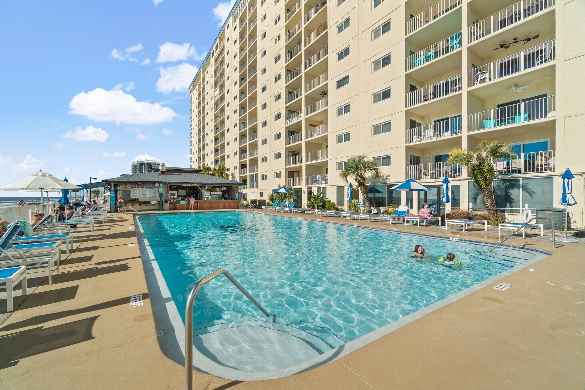 Fully updated 3rd floor 3 BR,  steps to pool, tiki hut, grills beach and more
