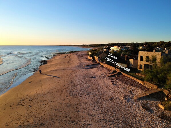 A la platja, gandules de platja i tovalloles de platja