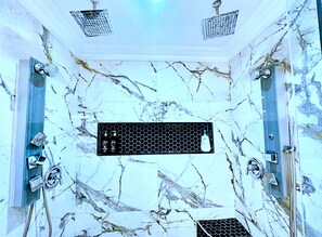 Shower, jetted bath, hair dryer, towels