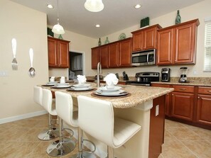 Fridge, microwave, oven, stovetop - Stunning 5 Bedroom 5 Bath Home In Paradise Palms Resort (Kissimmee)