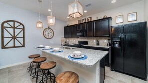 House | Private kitchen | Fridge, microwave, oven, stovetop - Solterra Resort 4 Bed 3.5 Bath Townhome With Splash Pool (Davenport)