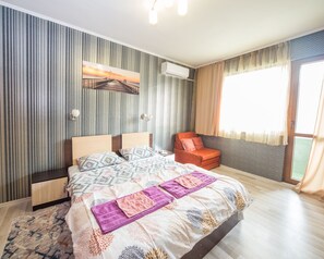 2 slaapkamers, een strijkplank/strijkijzer, gratis wifi, beddengoed