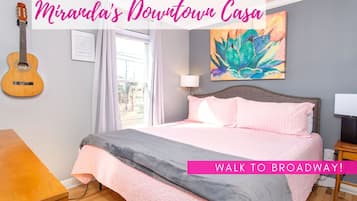 1 bedroom, desk, iron/ironing board, travel crib