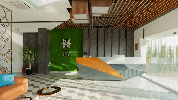 A modern reception area with a green wall, a reception desk, a checkered floor, and a large window. - Star Hill Hotel & SPA (Pristina)