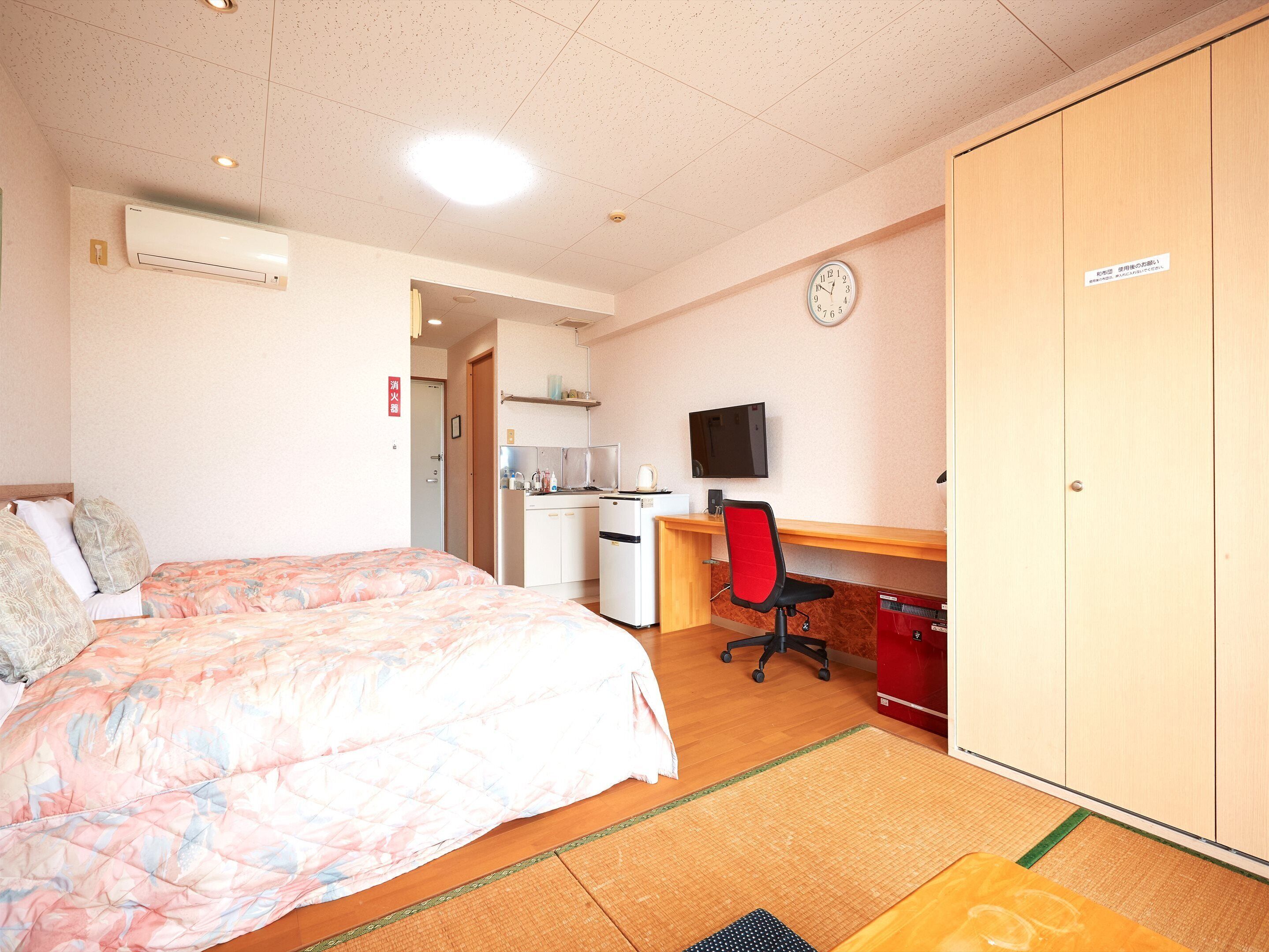 Fer et planche à repasser, draps fournis