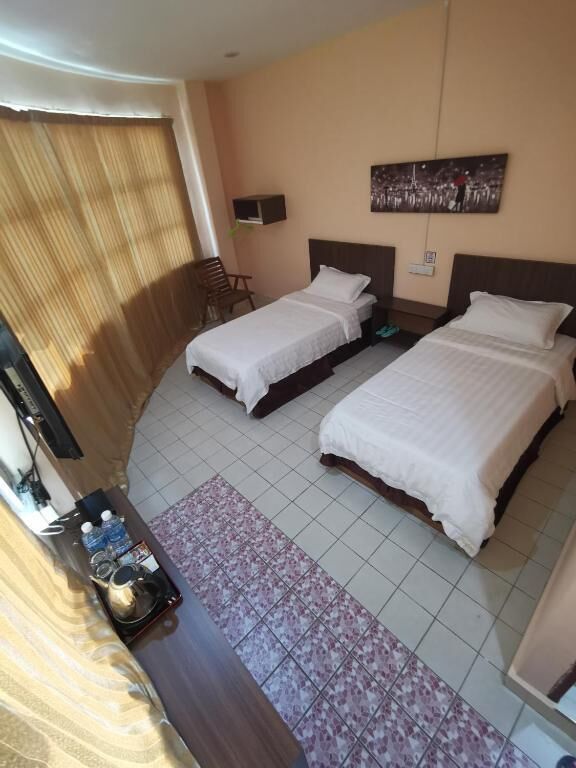 Blackout drapes, iron/ironing board, free WiFi, bed sheets