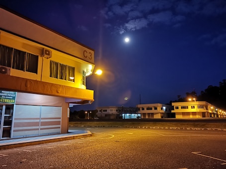 Front of property – evening/night. Indah Inn