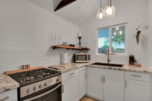 Fridge, microwave, oven, stovetop - The Black and White Bungalow is a freshly remodeled modern yet rustic studio.  (Yuba City)