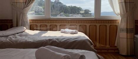 Double Room | Minibar, blackout drapes, iron/ironing board, free WiFi