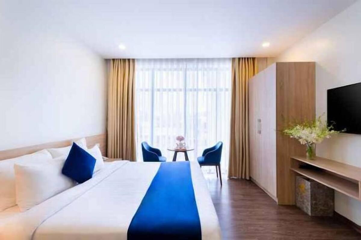 Premium-sengetøj, minibar, skrivebord, mørklægningsgardiner