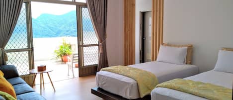 Family Quadruple Room, Multiple Beds, Mountain View | Blackout drapes, free WiFi, bed sheets