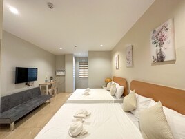 Desk, laptop workspace, free WiFi, bed sheets