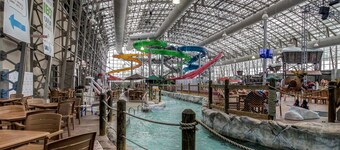 Inviting riverfront home with hot tub on deck & fireplace, near skiing & golf