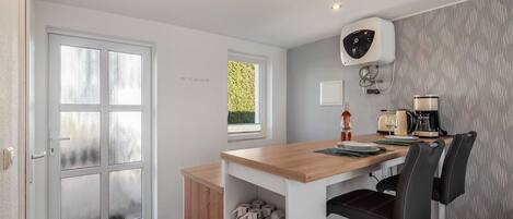 Fridge, coffee/tea maker, electric kettle, toaster