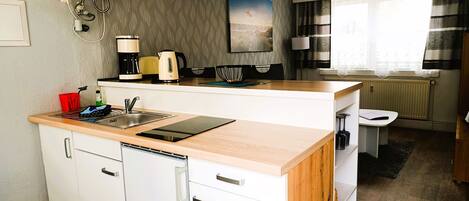 Fridge, coffee/tea maker, electric kettle, toaster