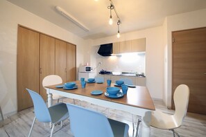 アパートメント 1 ベッドルーム | 客室内のダイニングエリア