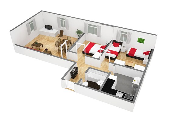 A 3-bedroom apartment with a dining area, kitchen, and a small balcony.