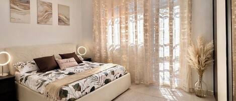 3 habitaciones, tabla de planchar con plancha y cuna de viaje
