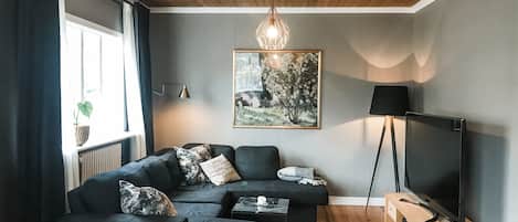 Family Apartment, 3 Bedrooms | Living area | Flat-screen TV