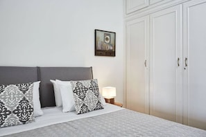 1 bedroom, desk, iron/ironing board, travel cot