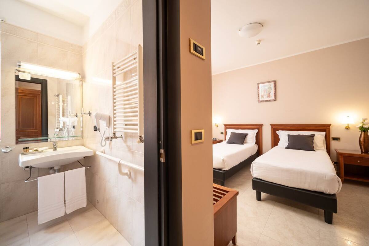 superior twin room | bathroom | shower, rainfall showerhead, free toiletries, hair dryer