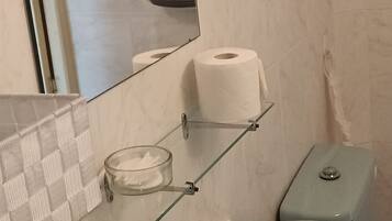 Shower, hair dryer, bathrobes, towels