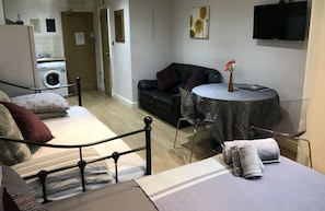 Studio Apartment | Living area | Plasma TV