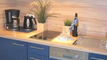 Fridge, microwave, dishwasher, coffee/tea maker