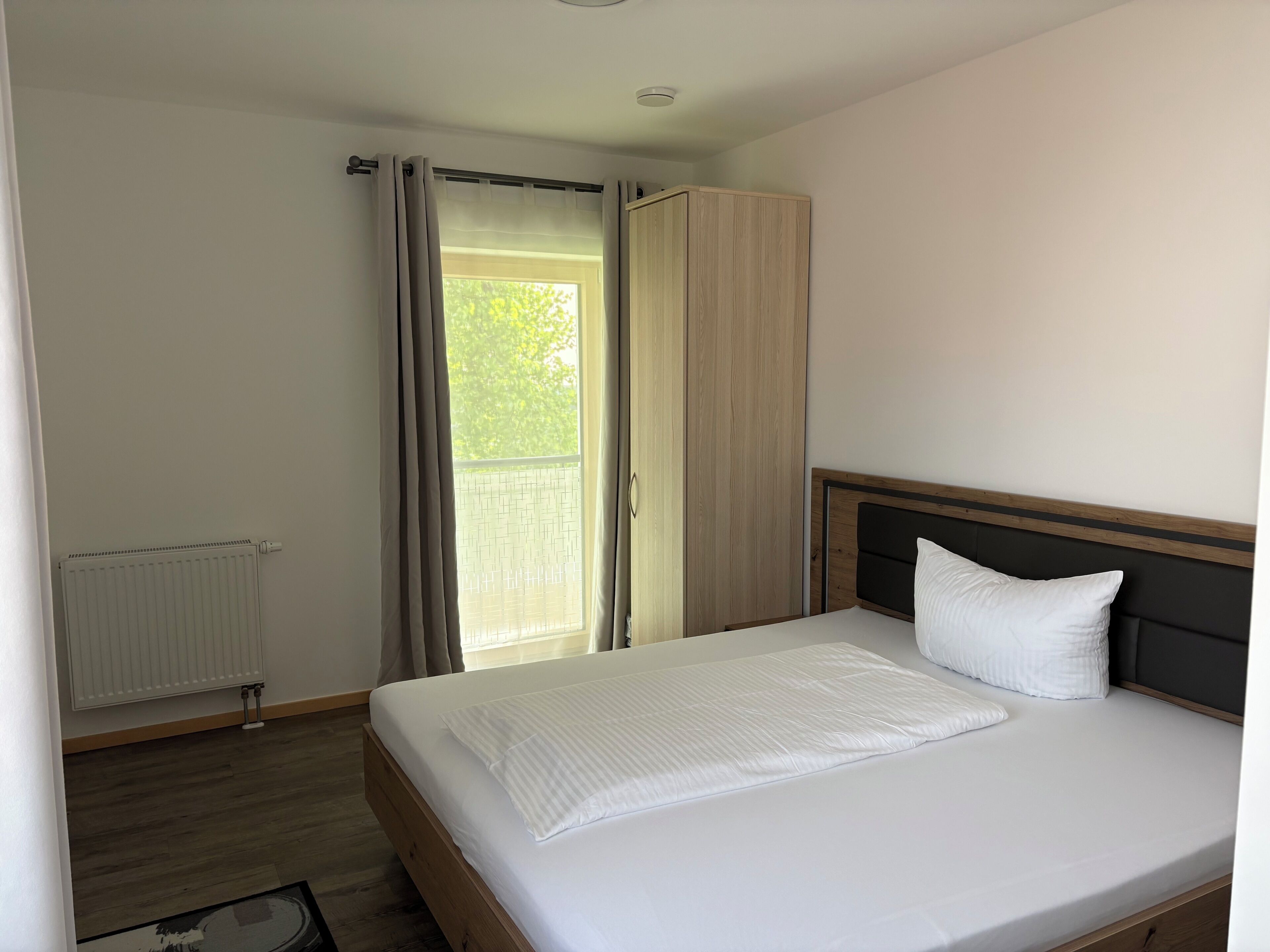 Double Room, Private Bathroom | Desk, blackout drapes, soundproofing, cribs/infant beds