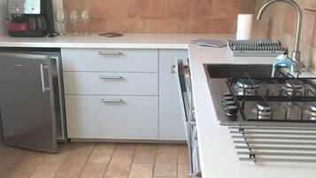 Apartment, 2 Bedrooms | Private kitchen | Mini-fridge, microwave, oven, stovetop
