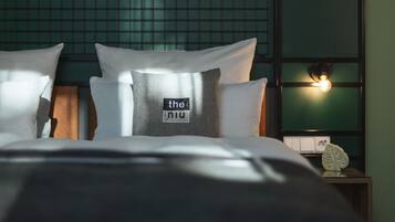 Hypo-allergenic bedding, in-room safe, individually decorated
