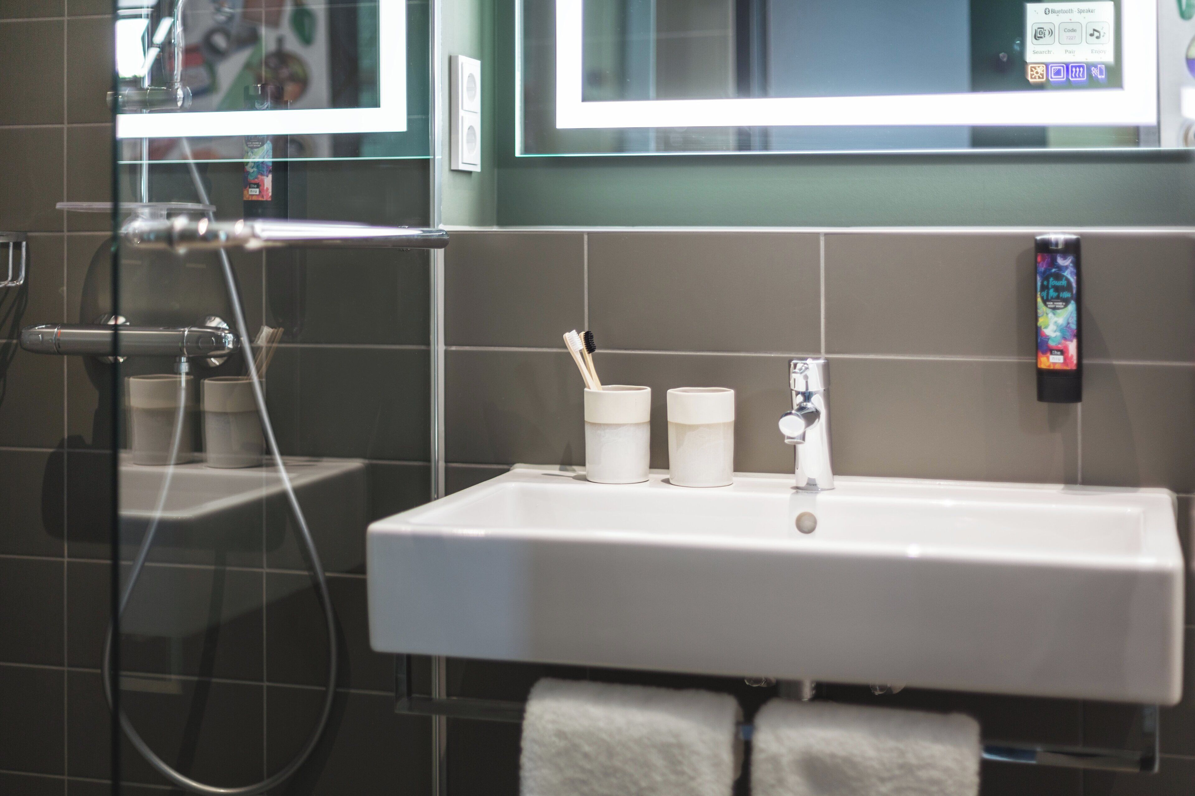 hair dryer, towels, soap, shampoo