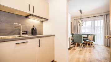 Basic Quadruple Room, 1 Bedroom, Non Smoking | Private kitchen | Full-sized fridge, stovetop, coffee/tea maker, electric kettle