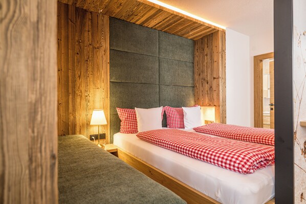 Basic Quadruple Room, 1 Bedroom, Non Smoking | Living area | TV