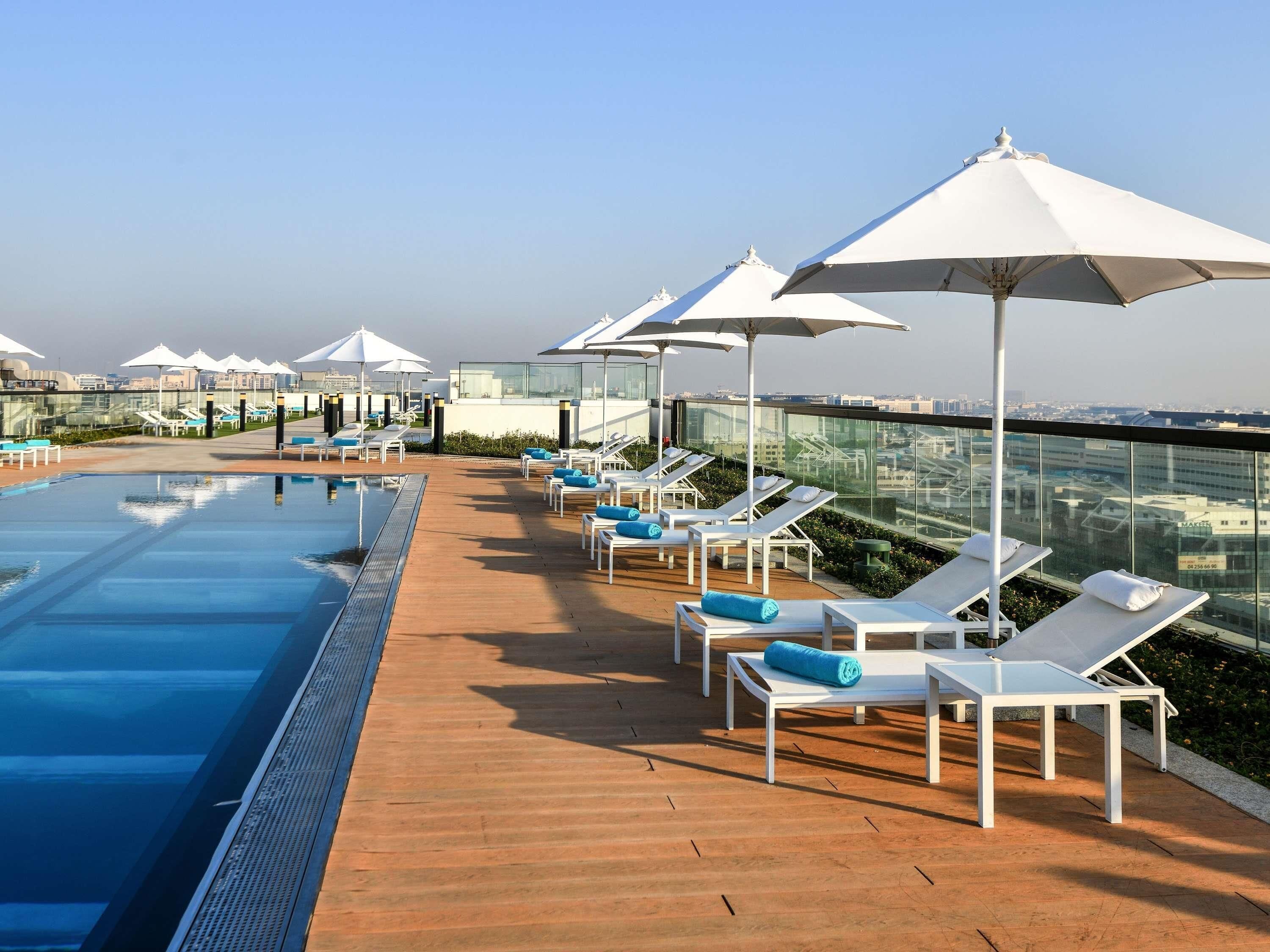 2 outdoor pools, pool umbrellas, pool loungers