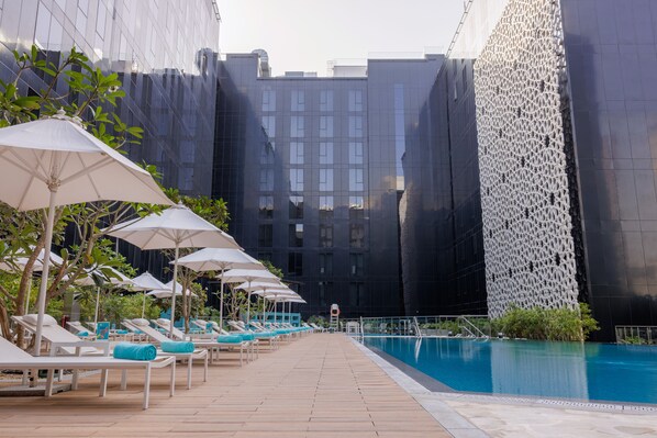 2 outdoor pools, pool umbrellas, sun loungers