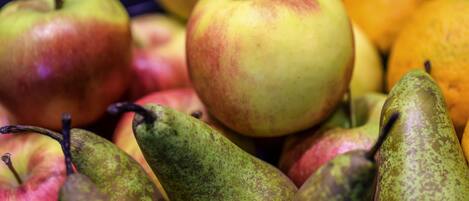 A variety of fruits including apples and pears.