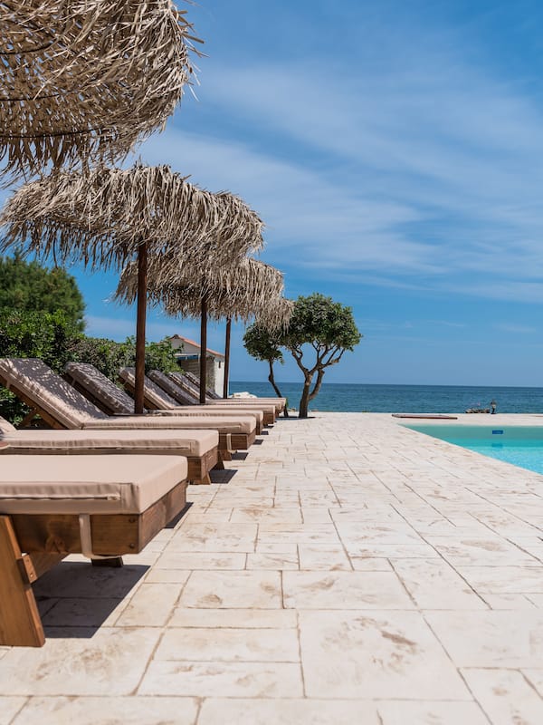 Seasonal outdoor pool, pool umbrellas, pool loungers