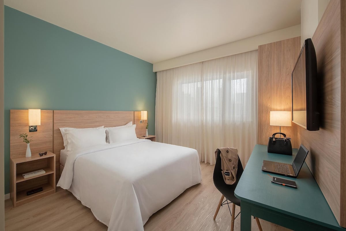 Desk, laptop workspace, WiFi (free), bed sheets