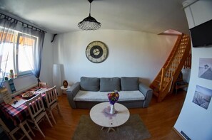 Comfort appartement | Woonkamer | Lcd-televisie