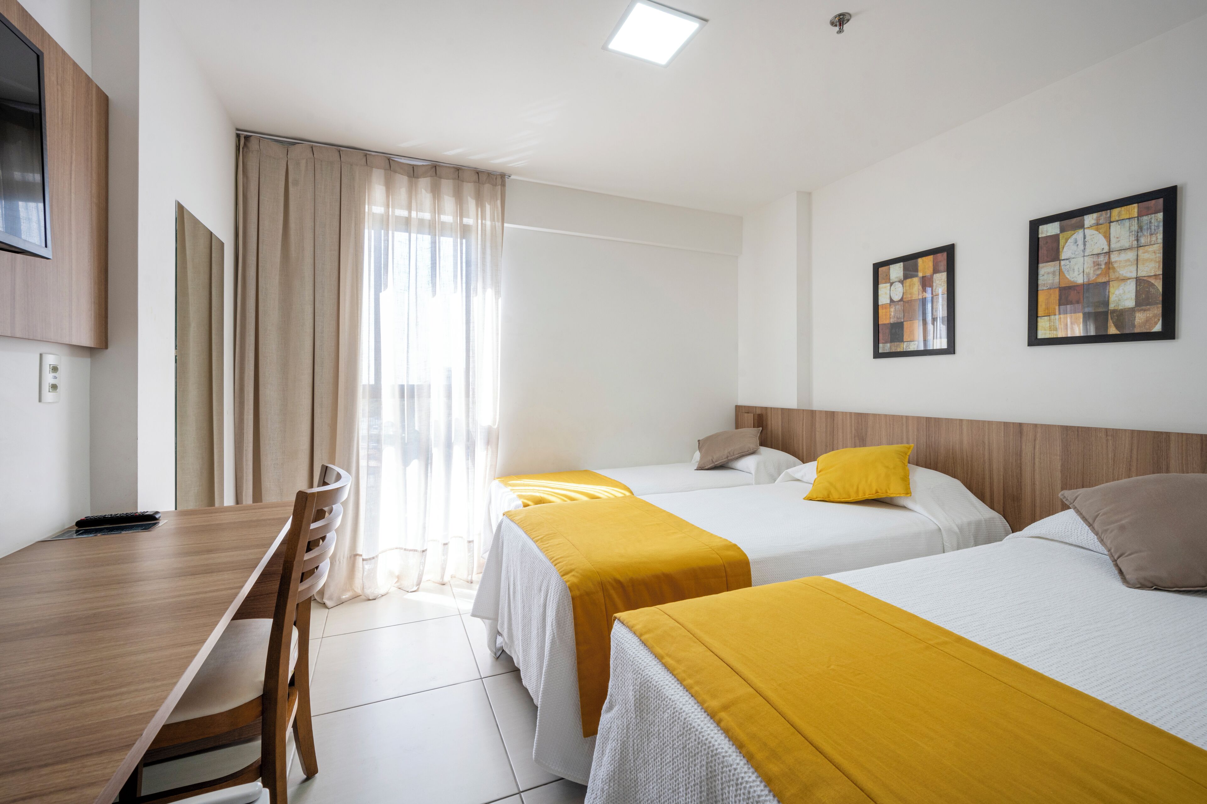 standard triple room | 1 bedroom, minibar, in-room safe, desk