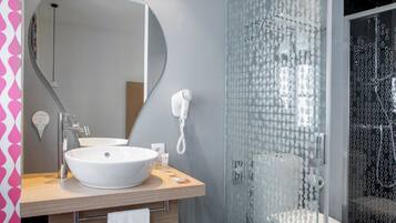 Shower, free toiletries, hair dryer, towels